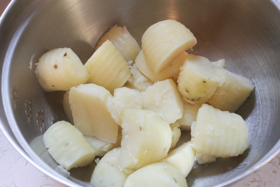 cooked quartered potatoes in an Instant Pot's insert pot