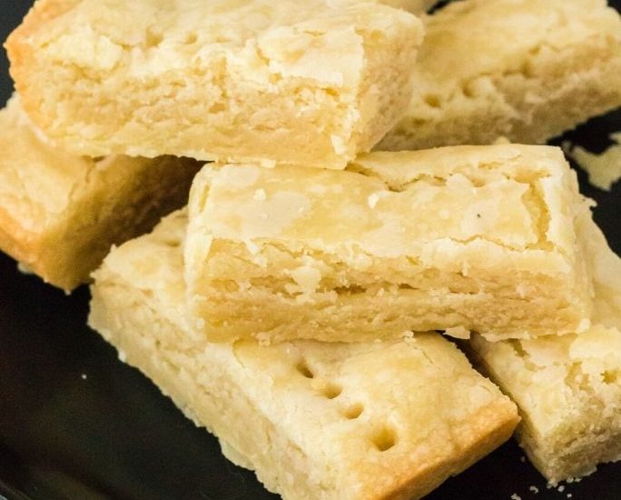 copycat walker's scottish shortbread cookies on a black plate