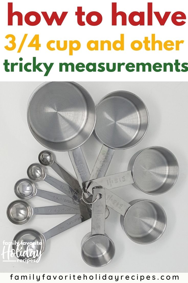 several stainless steel measuring cups and spoons splayed out