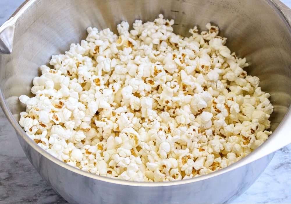 a bowl of freshly popped popcorn