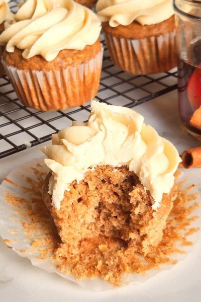 apple spice cupcake with a bite taken out of it