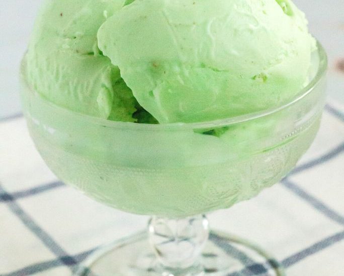 ninja creami pistachio ice cream served in a glass dish
