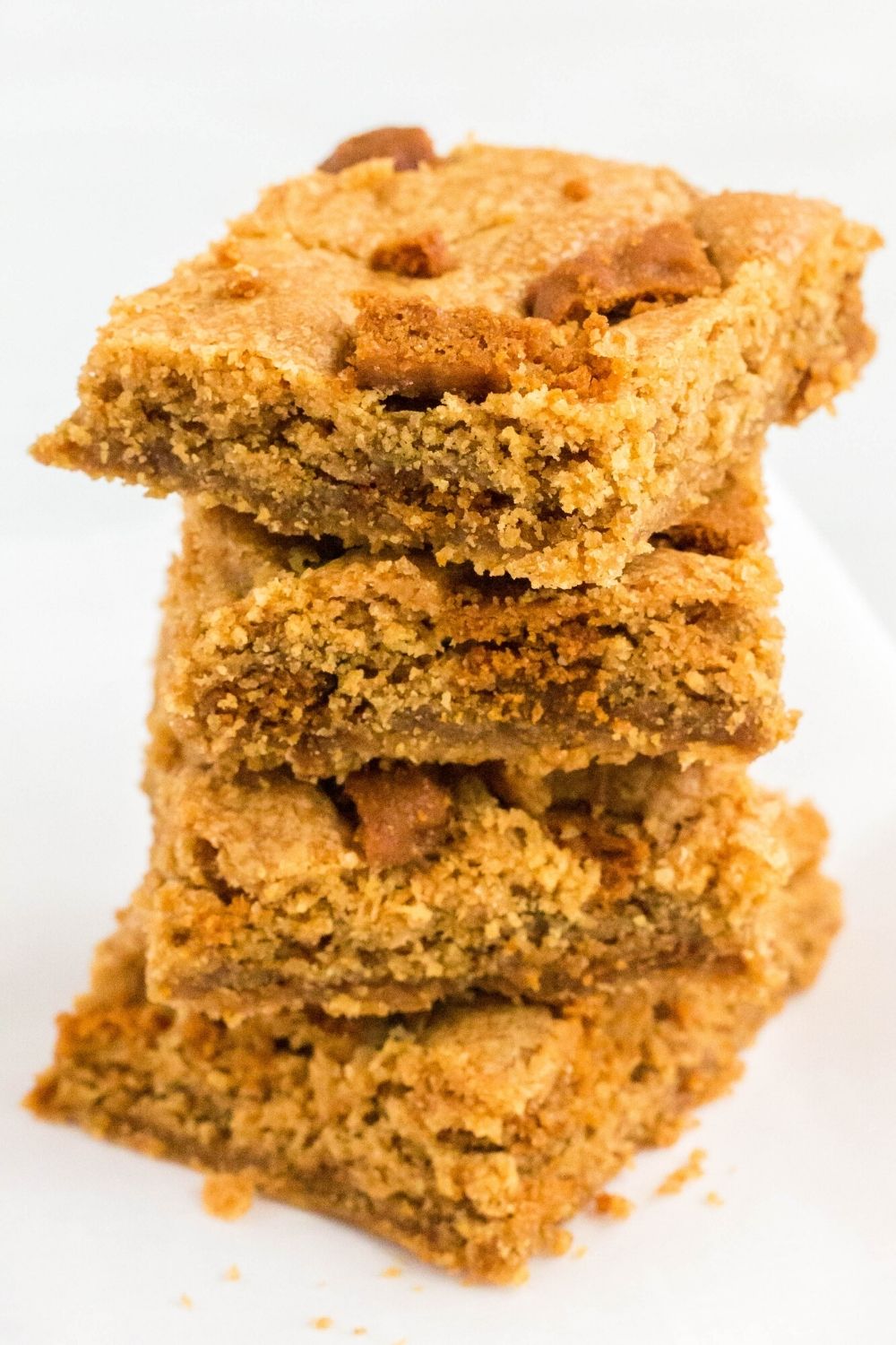 a few sliced Biscoff blondies stacked on top of each other